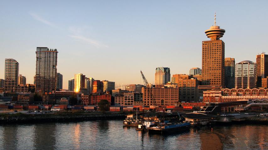 A cropped skyline photo of Vancouver looking south-west with the Harbour Centre building prominently visible.