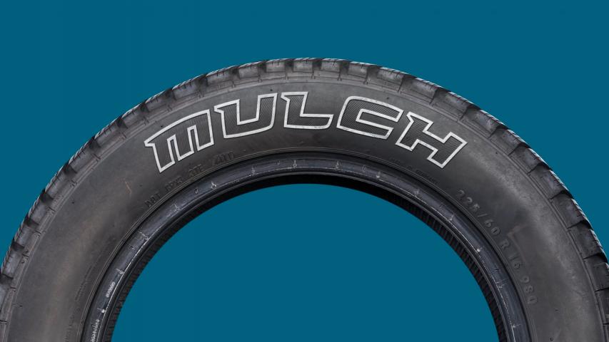 Photo of a tire where the sidewall text has been modified to read 'Mulch'